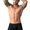 Man wearing black Male Power Eco Cozy Pouch Short front