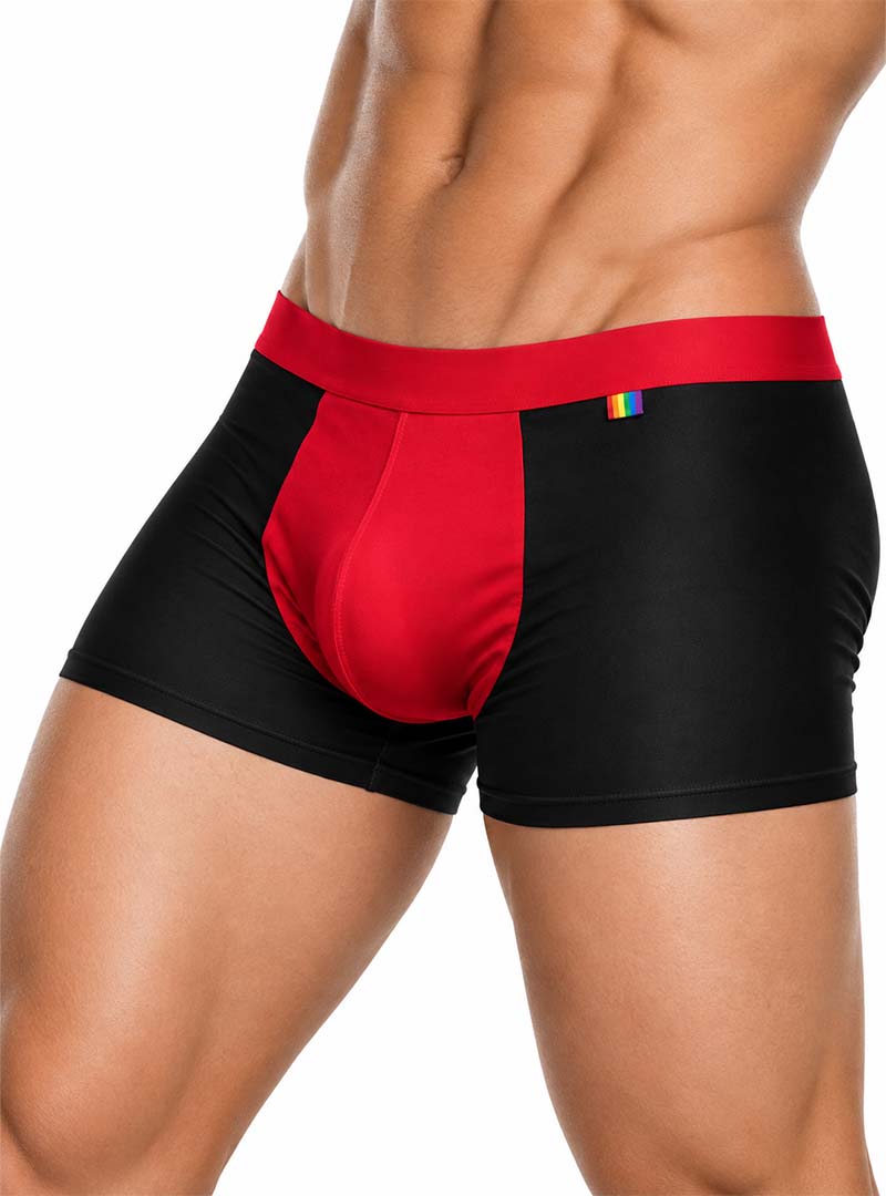 Man wearing black Pride Ultra Stretch Amplify Trunk on a white background, side view